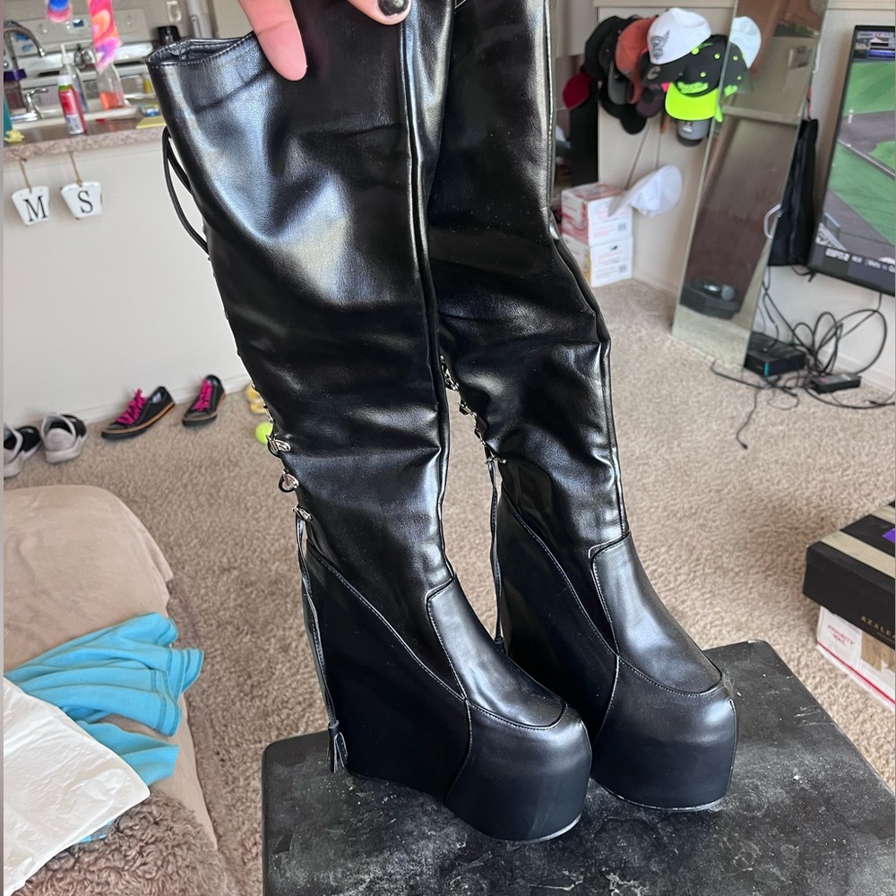 Knee high wedge boots